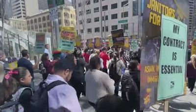 Tech janitors, hotel workers march in San Francisco together for better pay and conditions