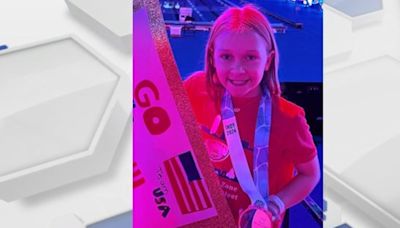 Lilly King gifts new gold medal to young fan at Olympic trials