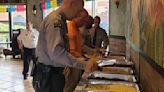 Thanks to a former colleague, Mexican was on the menu Thursday for these Greensboro police officers and other first responders