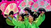 Students from Cahuenga Elementary School perform a Korean fan dance during a gathering to celebrate the opening of the 2023-24 school year.