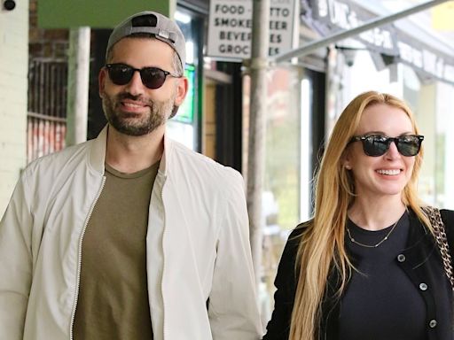 Lindsay Lohan and husband Bader Shammas stroll hand in hand