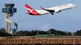 Qantas agrees to pay $79 million in compensation and a fine for selling seats on canceled flights