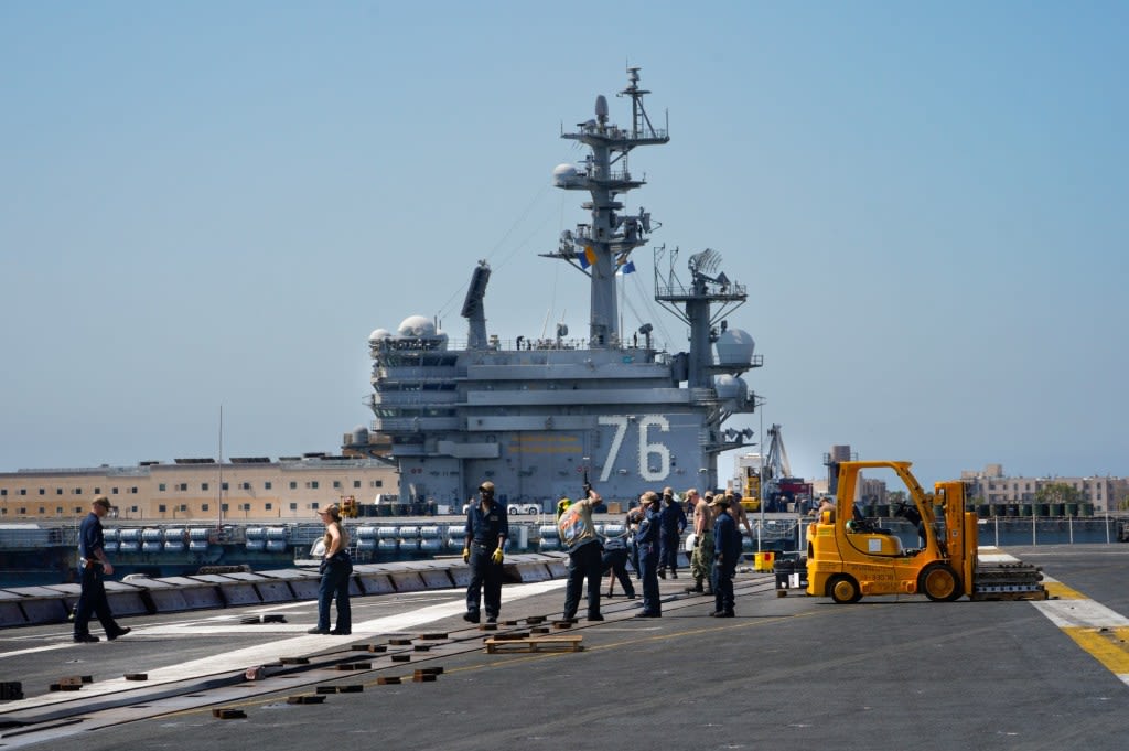 Delicate ballet unfolds in San Diego Bay as 2 aircraft carriers swap assets and people