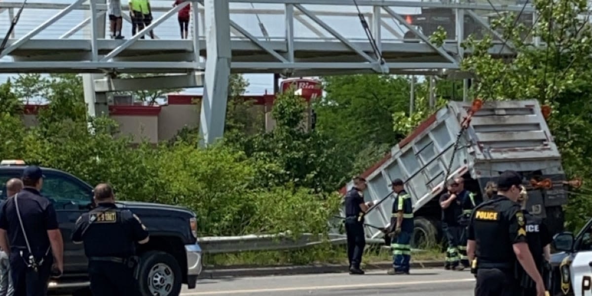 Dump truck crashes into Valley View canal