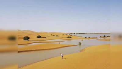 Rare rainfall transforms Sahara Desert, creating blue lagoons amid the sand dunes