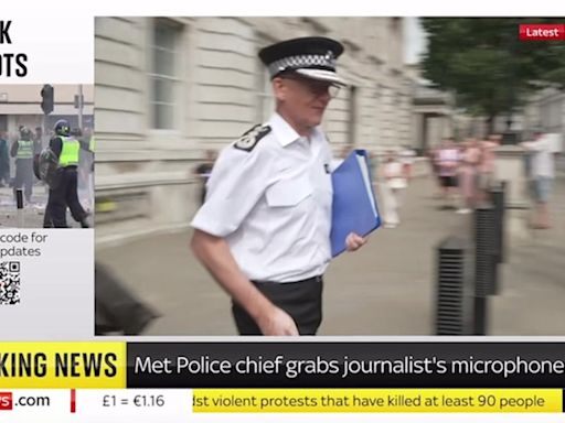 Met Police boss bizarrely snatches reporter’s microphone outside cabinet office when quizzed about riots