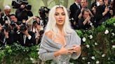 Kim Kardashian Explains Why She’s Awkwardly Holding a Gray Sweater at 2024 Met Gala