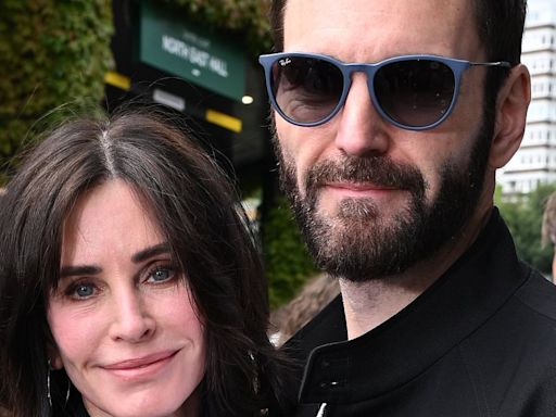 Courteney Cox cosies up to Johnny McDaid at Wimbledon Men's Final