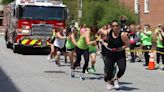 Brute strength and determination win the day at fire truck pull