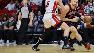 Heat dispose of Bulls, claim final East playoff berth