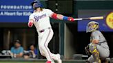 Texas Rangers rookie Davis Wendzel records his first major league hit against Seattle