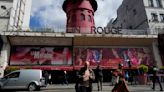 The windmill sails at Paris' iconic Moulin Rouge have collapsed. No injuries are reported