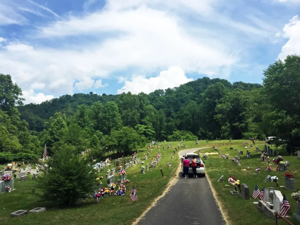 Bearing flowers and tradition, the next generation takes on the duty of Decoration Day