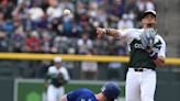 Elias Díaz has 2 hits including a tiebreaking single in a six-run 7th, Rockies beat Rangers 8-3