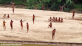 Rare pictures released of uncontacted Amazon rainforest tribe in Peru emerging near logging site