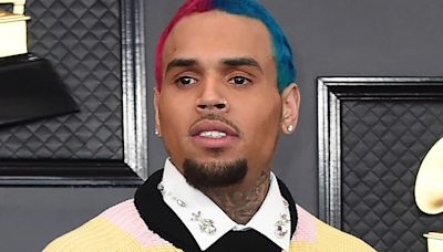 Chris Brown sued by men who claim to have been beaten after being invited backstage at Texas concert