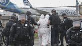 Anti-war protesters who closed roads near Sea-Tac Airport in April enter plea