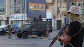Captured Libyan commander rejoins unit after clashes kill 55