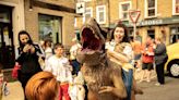 Come face to face with dinosaurs as they roam around town centre