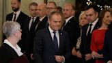 Eight years of conservative rule in Poland ends as Donald Tusk becomes prime minister