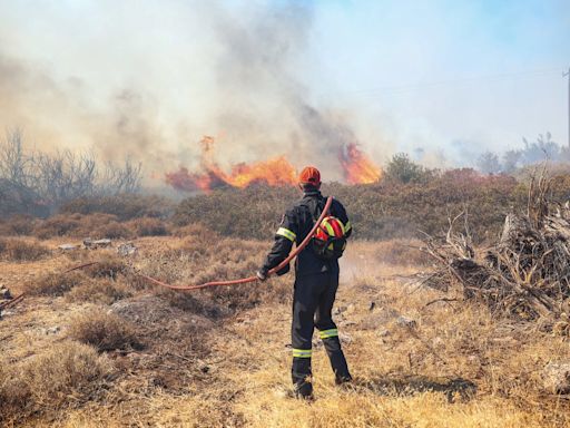 Greece wildfires - latest: One third of forest land in Athens area wiped out as 40C heat sparks flare-up fears