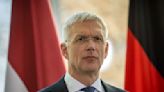 Latvia's foreign minister resigns over charter flight scandal