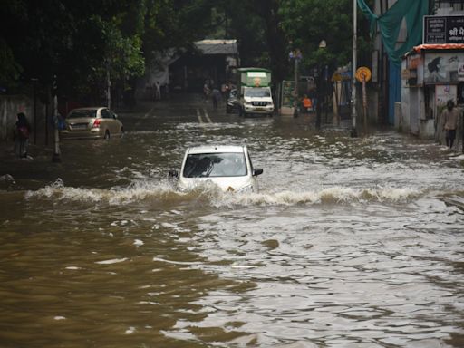 Mumbai lashed by half of London’s annual rainfall in just six hours as city comes to standstill