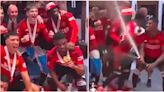 Kobbie Mainoo removed Amad Diallo from United celebrations when the champagne started spraying