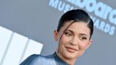 Photos of Kylie Jenner handling Kylie Cosmetics products without gloves or a hairnet sparked hygiene concerns, but sources say the makeup isn't for sale