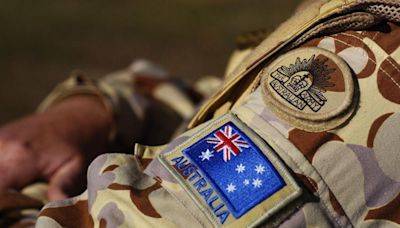 Australia strips officers' medals for war crimes culture