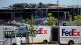 After tornadoes tear through West Michigan, emergency workers search through wreckage