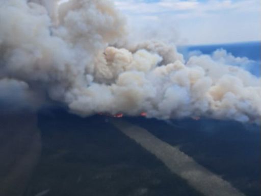 Rain in forecast as forest fire rages near evacuated Churchill Falls power plant