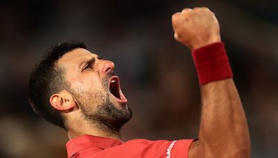 Novak Djokovic calms French Open doubts with straight-sets victory over Pierre-Hugues Herbert