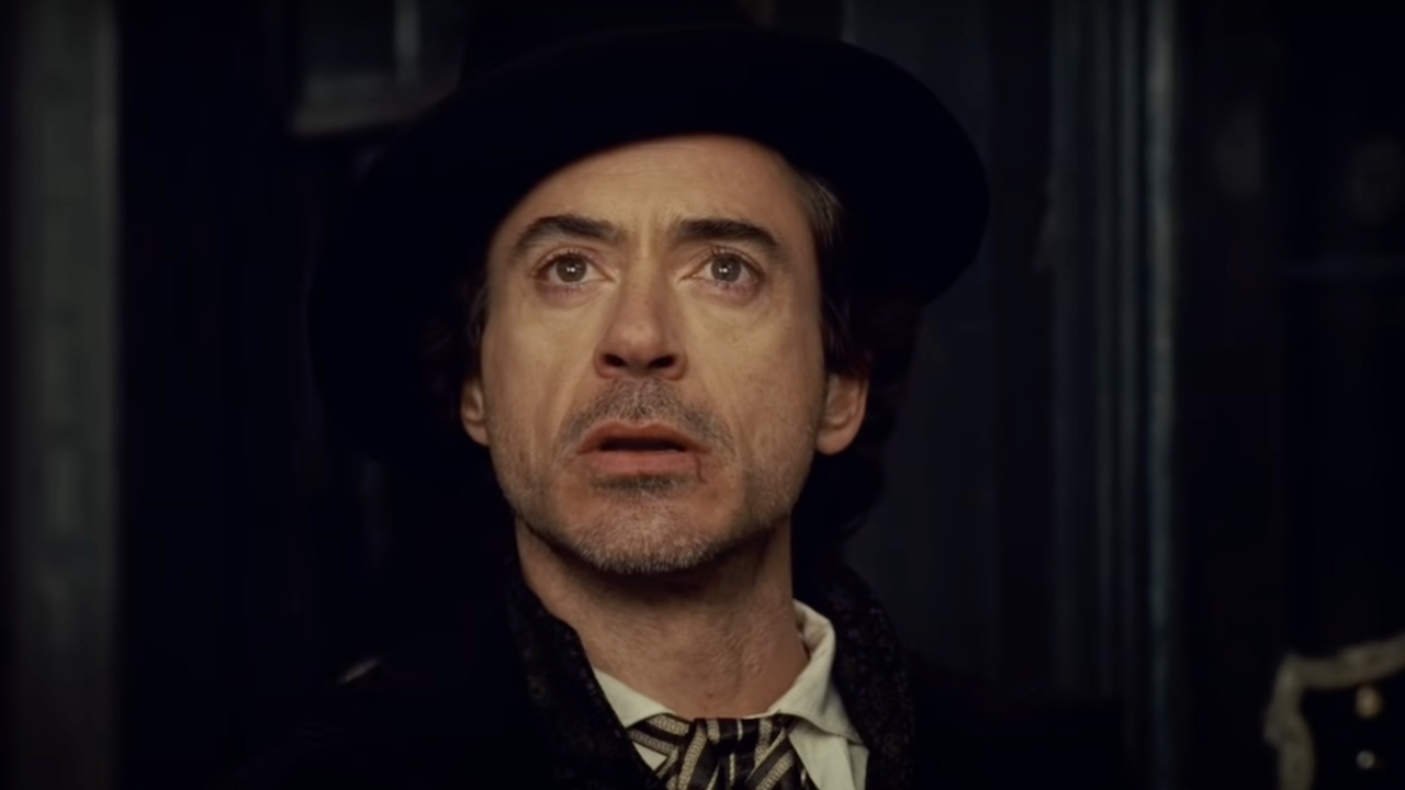 ...Robert Downey Jr. Chose ‘A Porn-Looking Mustache’ For Sherlock Holmes, And His Wife Had To Be The Bearer Of...