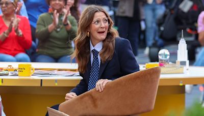 Drew Barrymore FALLS out of her chair in front of shocked audience