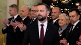 Polish defense minister fends off criticism after he says he keeps an emergency backpack ready