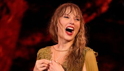 It Rained At Taylor Swift's Concert—But Her Red Lip Didn't Budge