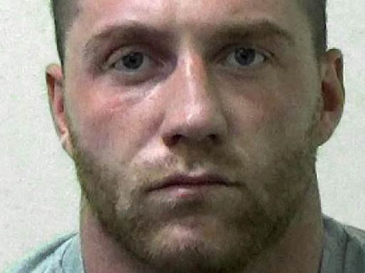 Road rage killer who beat pedestrian to death is jailed for 14 years