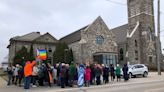 Catholic priest resigns from Michigan church following protests over his criticism of a gay author