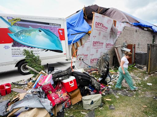 Storms damage homes in Oklahoma and Kansas. But in Houston, most power is restored