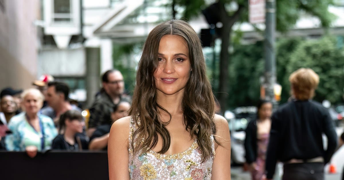 Alicia Vikander Is a Sci-Fi Princess In a High Slit Dress & UFO Mini Bag