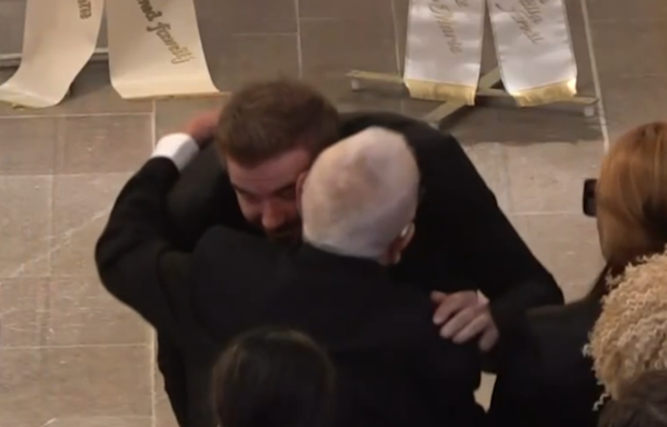 David Beckham hugs Sven-Goran Eriksson’s father at England manager’s funeral