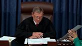 U.S. Supreme Court chief declines to discuss Alito flag uproar, ethics with Senate Dems