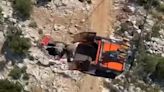 Video reveals moment passenger is airlifted from collapsed cable car pod