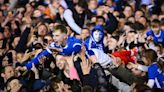 Portsmouth charged after promotion pitch invasion