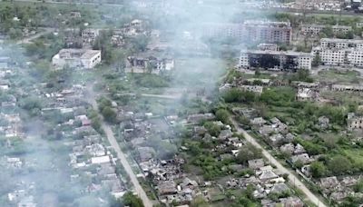 Drone footage shows Ukrainian village battered to ruins as residents flee Russian advance