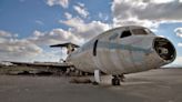 Inside abandoned airport untouched for 50 years with rotting plane still on runway