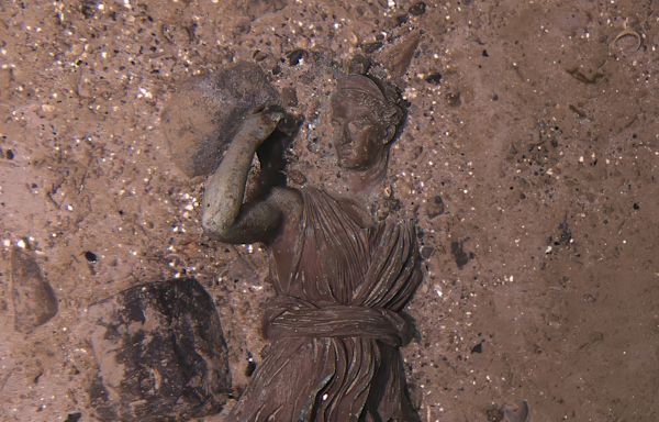 Titanic divers find long-sought statue, signs of accelerating decay