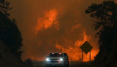 Evacuations ordered as wildfire burns in foothills of national forest east of LA