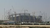 "Hundreds of workers" died to build Qatar World Cup, rights group says